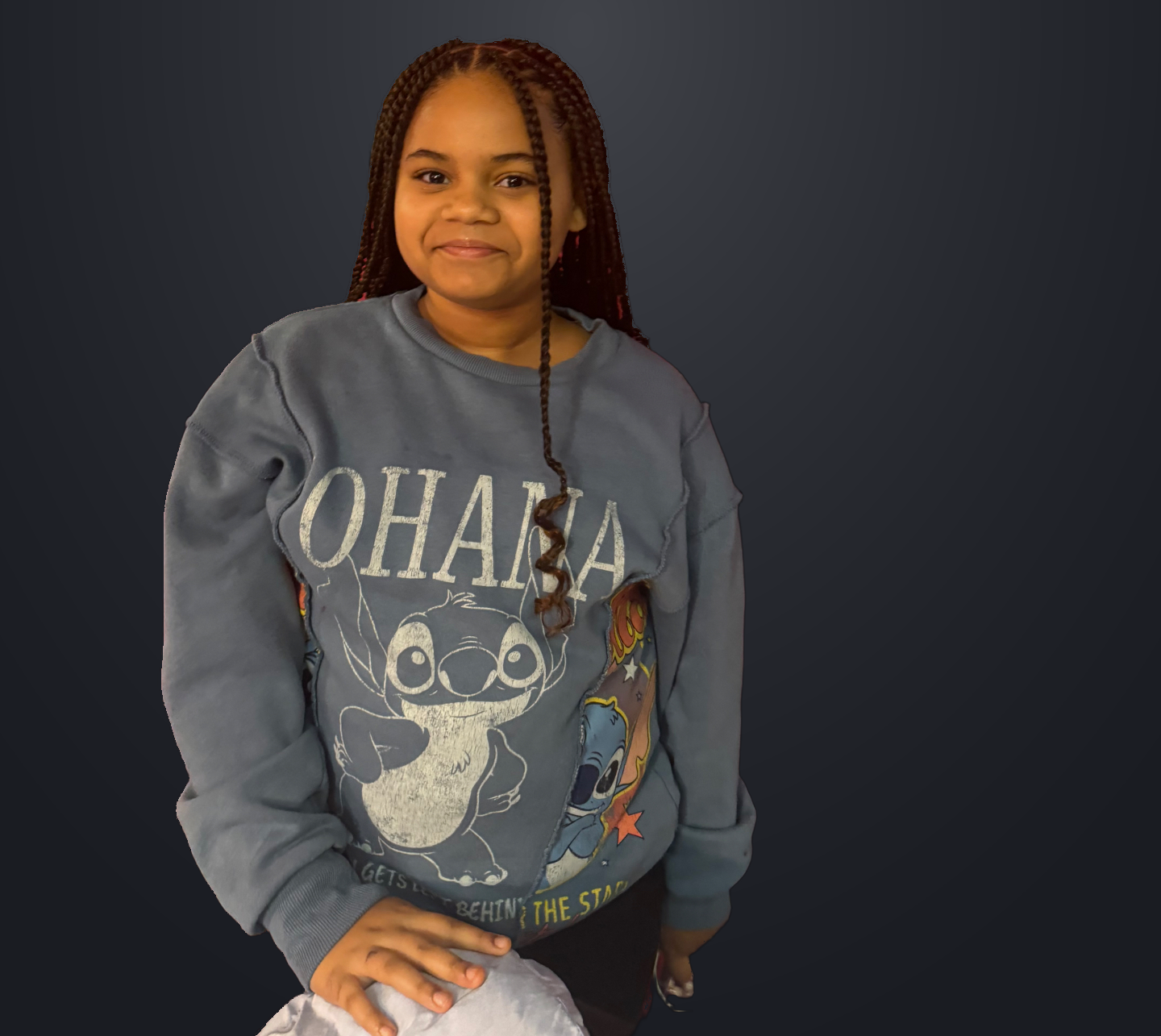 Londyn smiling in her blue Ohana sweatshirt
